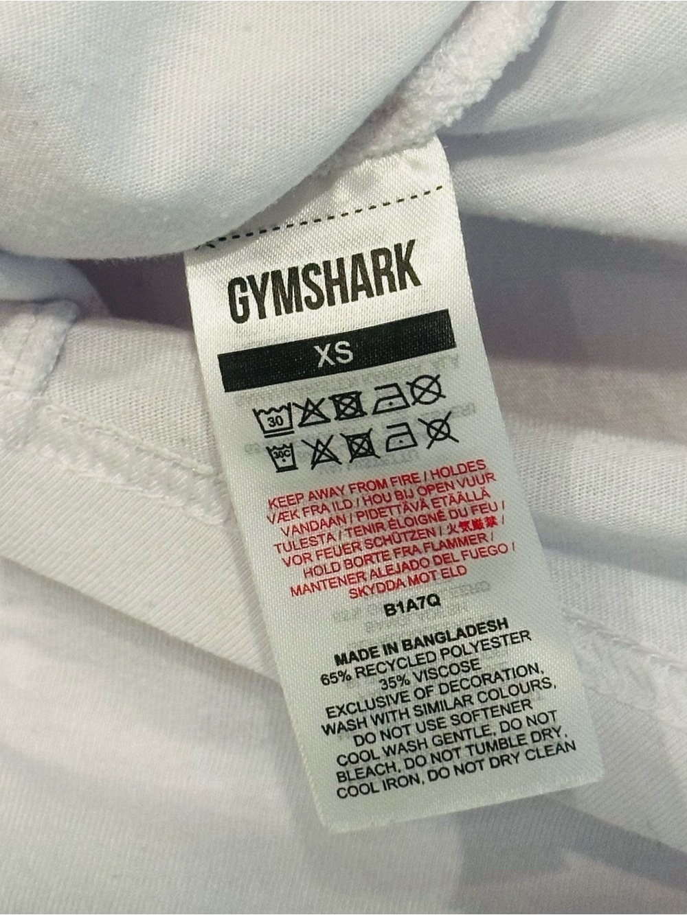 Gymshark White Rolled Sleeve Asymmetrical Hem Tee XS - Picture 11 of 11